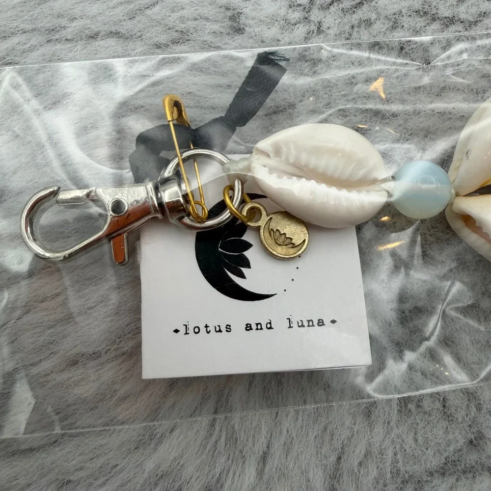 Lotus and Luna Keychain OS Charcoal Grey Cowrie Shell Moonstone Tassel NEW